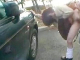 Japanese Teacher Sluts Students Hard in Car Park Fuckfest